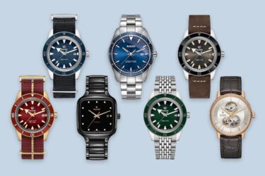 Seven Rado watches displayed on blue background.