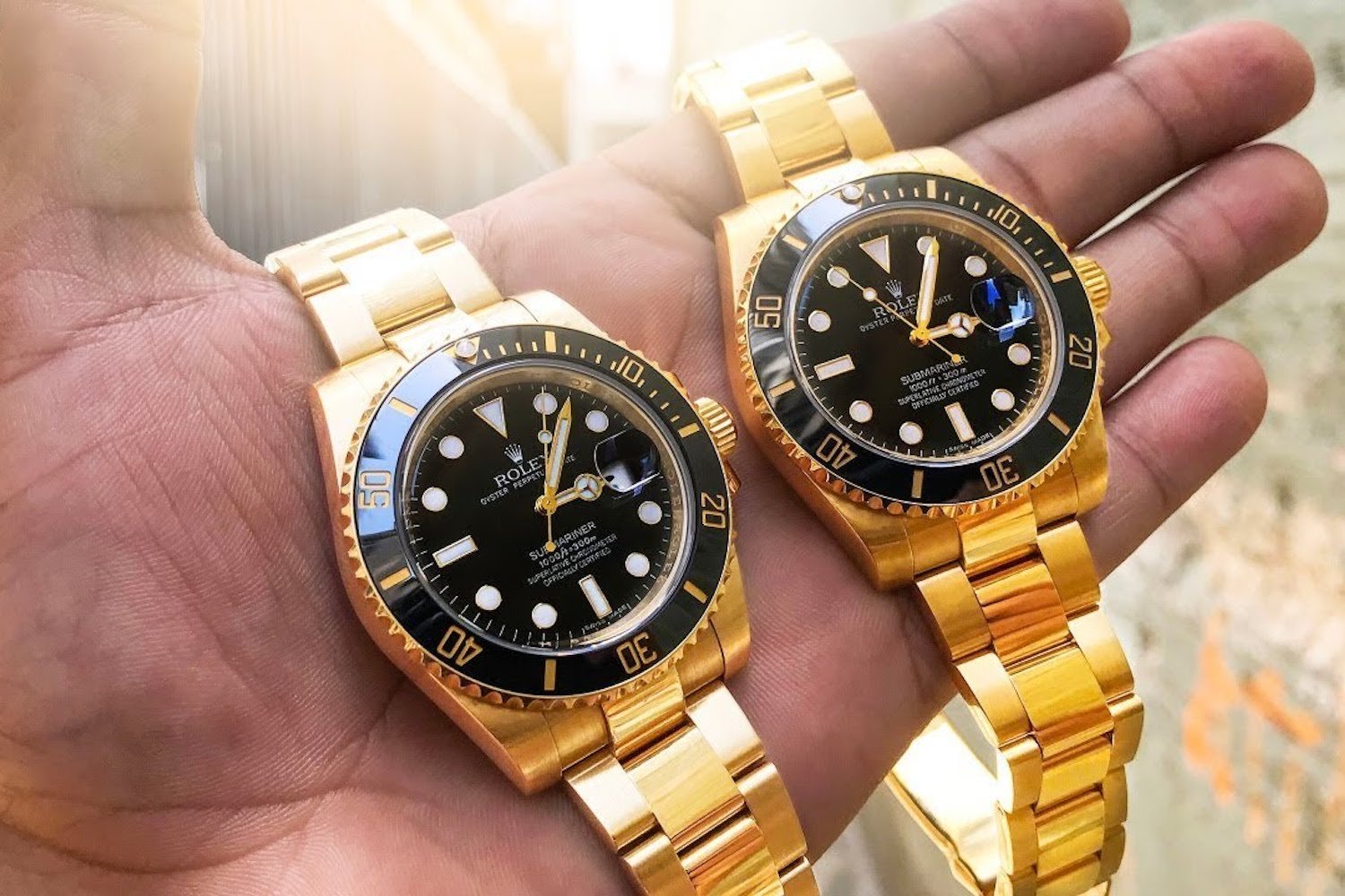 Gold watches with rotating bezels shimmer brilliantly.