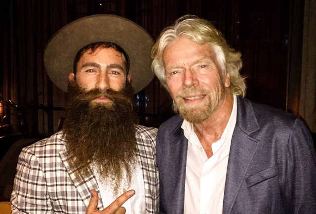 Two bearded men posing for Beard Season photo.
