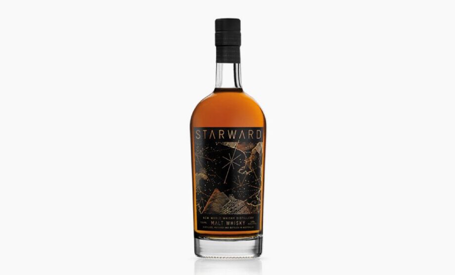 Starward whisky bottle, golden liquid.