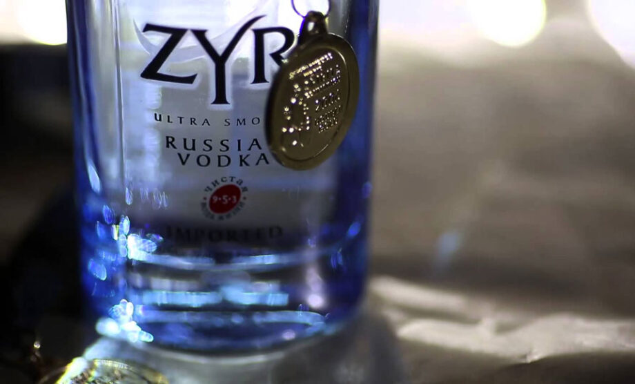 Close-up of ZYR Vodka bottle.